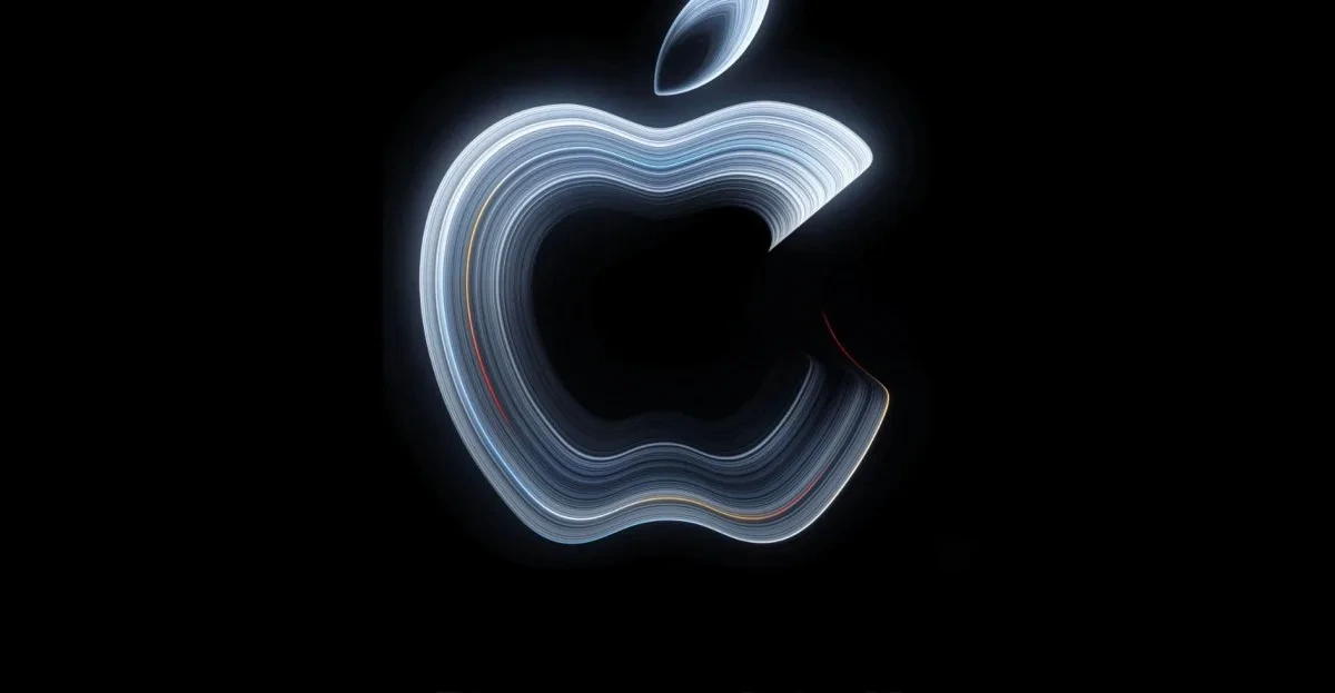Siyah arka plan üzerinde ışıklı Apple logosu