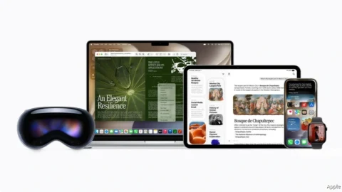 Apple Vision Pro, MacBook, iPad, iPhone ve Apple Watch cihazları birlikte gösteriliyor
