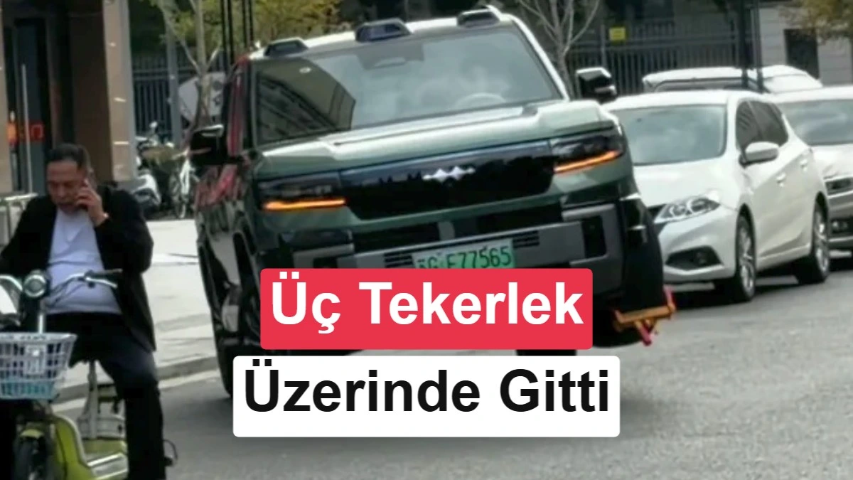 Çin’de bir BYD, üç tekerlek üzerinde ilerlerken