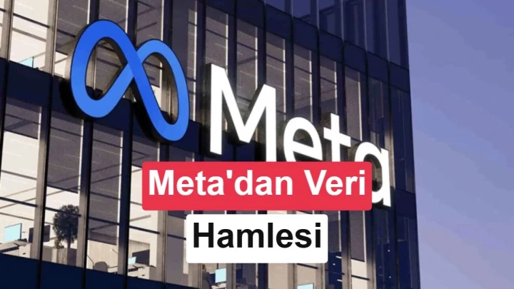 Bir etkinlik alanında Meta logosunun yer aldığı büyük sahne panosu