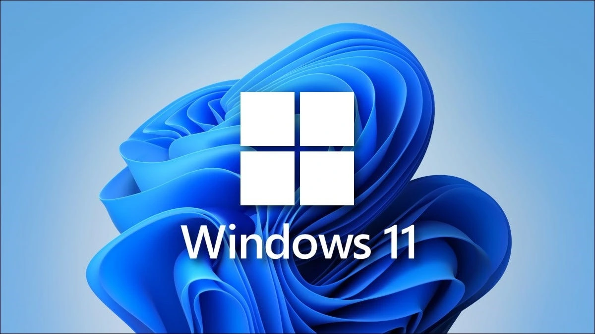 Windows 11 logosu ve mavi arka plan