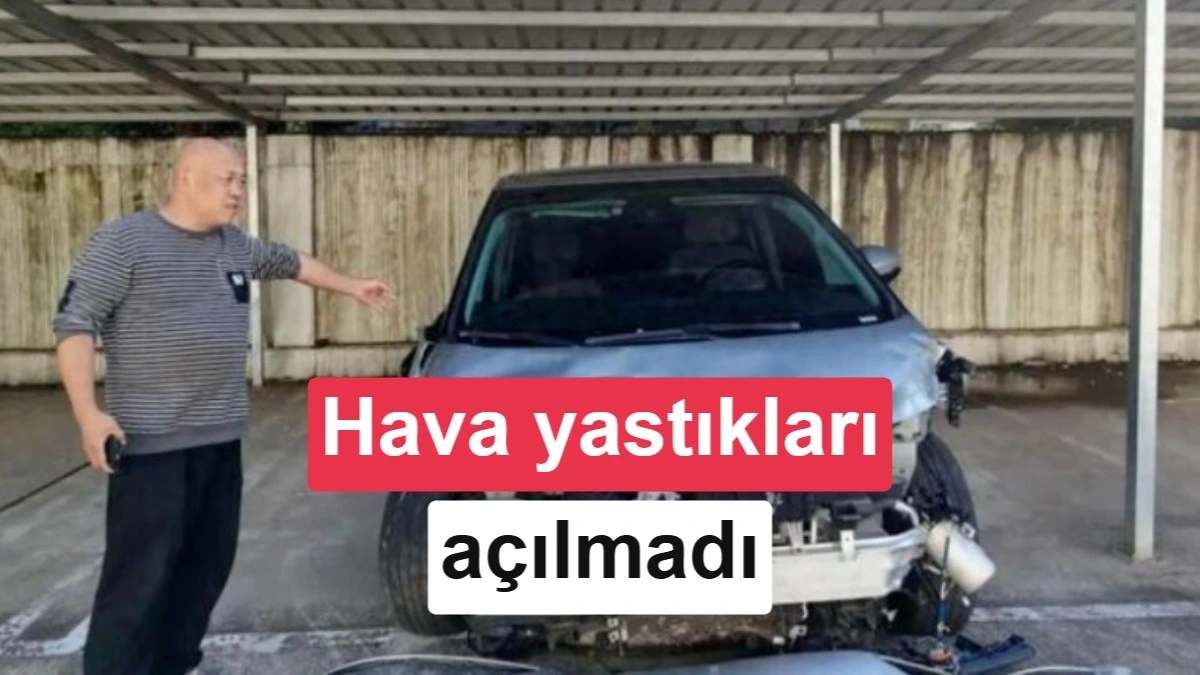 Bir kişinin önünde duran, ön kısmı ağır hasarlı Xpeng X9; görselde hava yastıklarının açılmadığı belirtiliyor